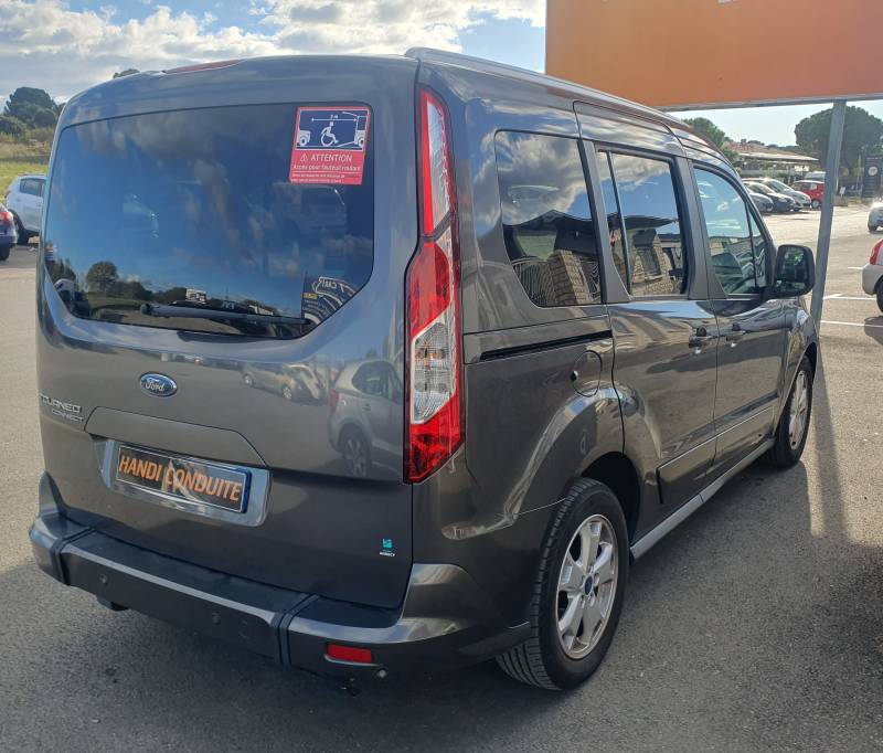 Vente Ford Tourneo décaissé pour le transport d'une personne en fauteuil roulant, 59 000km et en très bon état intérieur et extérieur
