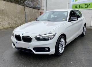 À vendre BMW série 1 en bon état adaptée conduite PMR avec combiné accélérateur frein par manette au volant sur Lille