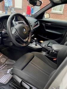 À saisir, BMW série 1 en vente avec poste de conduite équipé d'un combiné accélérateur frein par manette pour la conduite PMR sur Lille