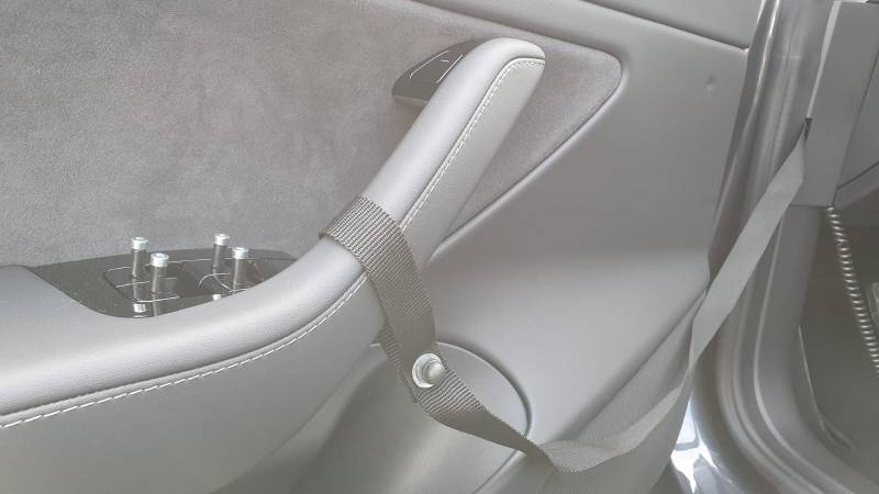Adaptation sangle de fermeture de portière côté conducteur par Handi Conduite à Vendargues