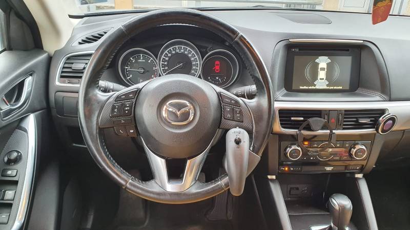 Télécommande au volant Joy Control reprenant les fonctions du commodo du véhicule grâce à un mini joystick, une création Lenoir Handi Concept adaptée par Handi Conduite à Montpellier