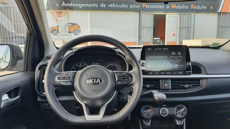 Adaptation pour la conduite d'une personne handicapée avec levier de frein manuel à baisser à Montpellier par Handi Conduite